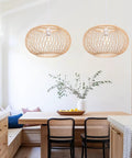 Round Bamboo Weave Pendant Light For Kitchen Island And Living Room, Coastal Boho Wicker Chandelier in modern kitchen setting.