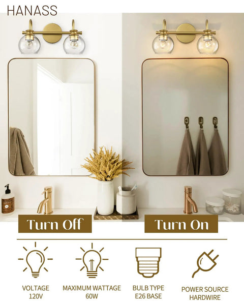 Gold Finish 15 Inch Two Light Vanity Light With Clear Globe Glass Shades Dope Modern Steel Bath Fixture showing on and off view above mirrors