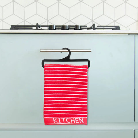 Red striped towel hanging on black plastic hanger from set of 50 black plastic hangers for home and retail display in kitchen