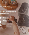 Hands using Smart WiFi Single Serve Coffee Maker For Home Baristas That Delivers Coffee Lattes And Cappuccinos With Built In Frother BrewID Pod Recognition And Six Brew Sizes Black with smartphone and ingredients.