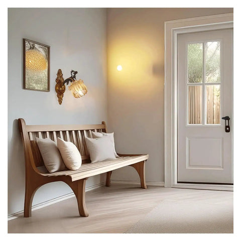 LMAPLUMP Wall Lamp Wall Sconce Classical European Vintage Antique Zinc Alloy Flower Glass Shade Crystal Accents Light for Bedroom Bedside beside a wooden bench.