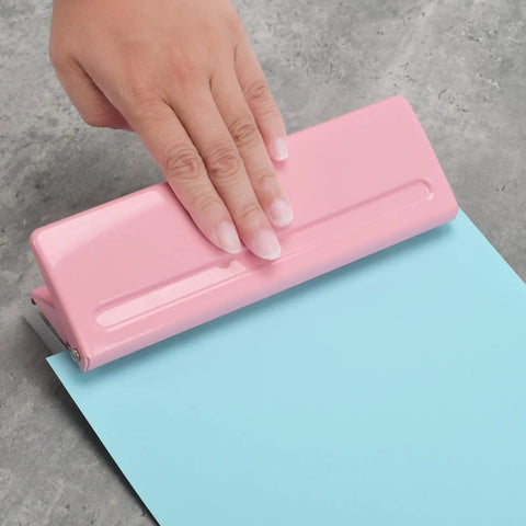 Adjustable 6 Hole Punch For A4 A5 A6 Personal And Pocket Planners Durable Metal Construction With Non Slip Base in use
