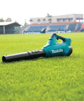 Beast Brushless Cordless Blower Tool Only With 36V (18V X2) LXT System on grass field, featuring sleek design