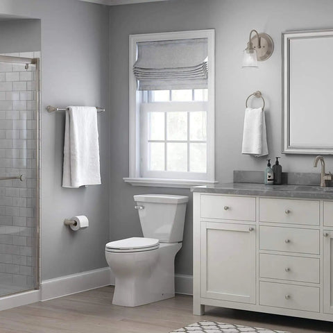 Modern bathroom featuring 3 Piece Satin Nickel Bathroom Hardware Set with 24 inch towel rack, towel ring, and toilet paper holder shown.
