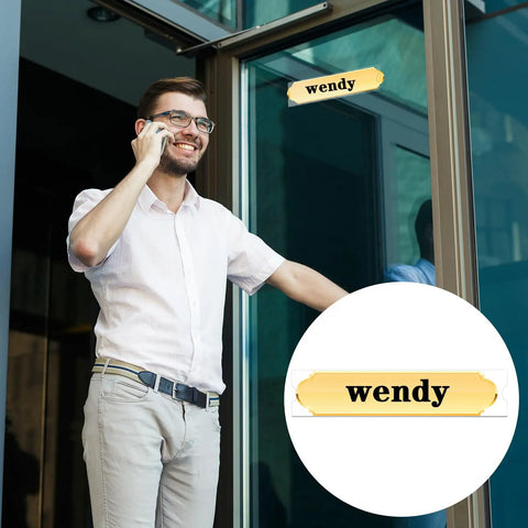 Clear 8 Inch Acrylic Name Plate Holder 2x8 Inch Wall Sign Display Pack of 20 with Sticky Tape shown on glass door