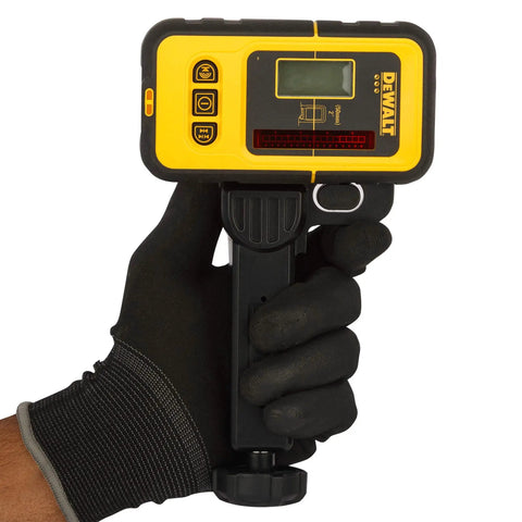 Person holding Battery-Free Line Laser Detector For DW088K And DW089K With Backlit LCD, Narrow Or Wide Accuracy, Heavy-Duty Clamp.