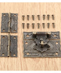 Three Piece Old School Antique Bronze Box Latch Set With Vintage Hasp Clasp And Hinges on wood surface