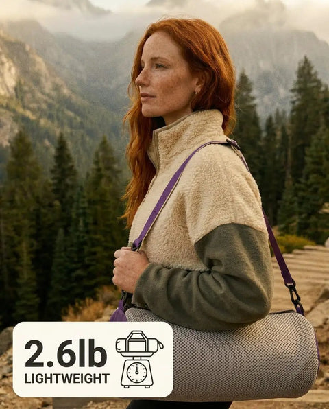Person holding a Capy OG Low Back Camping Chair With Tri Lock Stability Ultra Lightweight Portable Camp Chair For Camping Fishing Beach Picnics Hiking And Campfire Sesh in carry bag