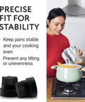 Woman cooking on stove with installed 20 Pack Rubber Grate Feet Replacement for Stoves and Ranges, Heat Resistant, focus on stability.