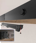 2 Piece Barn Door Soft Close Mechanism Set With Upgraded Universal Weight Compatibility Supports Doors Up To 160 Lbs For Effortless Opening And Smooth Quiet Closing Hole Free Sliding Door Hardware Spring Buffer Damper installed under a wooden barn door track shown from a side angle