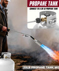 Person using Heavy Duty Propane Weed Torch Kit With Turbo Trigger, high BTU flame reaches 28 to 32 inches, 1lb converter and 10ft hose.