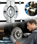 Mechanic using Beefy Bearing Puller For Cars And Trucks Pro Grade Auto Maintenance Tool for precise bearing removal