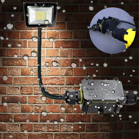 Installed Beefy Waterproof IP68 Junction Box 2 Way M20 Connector For Outdoor Coaxial Cable 5 To 12mm against wet brick wall