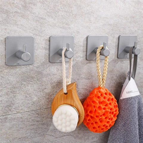 Heavy Duty White Bathroom Wall Hooks Set Featuring A No Fuss Towel Rack Sturdy Toilet Paper Holder And Slick Coat Hanger For Effortless Multipurpose Home Organization with sponges.