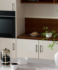 Modern kitchen with cabinets featuring 5 Inch Cabinet Pulls 10 Pack Square Zinc Alloy Drawer Handles in black and brushed nickel.