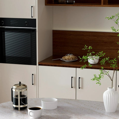 Modern kitchen with cabinets featuring 5 Inch Cabinet Pulls 10 Pack Square Zinc Alloy Drawer Handles in black and brushed nickel.