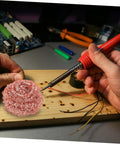 Hands using Six Pack Soldering Tip Copper Wire Sponge Balls For Efficient Tin Removal And Clean Tip during electronics repair.