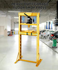 12 Ton Heavy Duty H Frame Hydraulic Shop Press Solid Steel Garage Workhorse with yellow frame in auto repair shop.