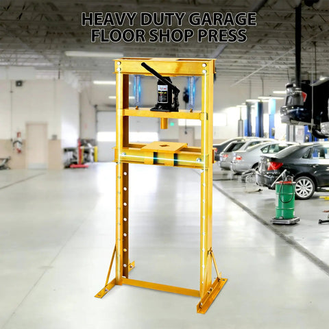 12 Ton Heavy Duty H Frame Hydraulic Shop Press Solid Steel Garage Workhorse with yellow frame in auto repair shop.