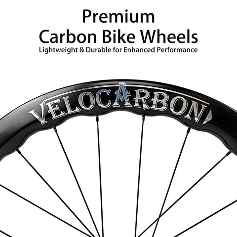 Close-up of Ultra Lightweight Carbon Wheelset 700C Aero Racing Tubeless Ready Clincher rim with Velocarbon branding.
