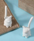 2 Piece Cat Design Toilet Bolt Covers In Crisp White Straight Up Premium Ceramic Screw Caps With Gotta Have Ease Of Installation Decorative Bathroom Replacement Hardware Bringing A Total Game Changer Energy on burlap background.