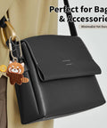 Premium Brass Key Ring With Screw Lock Carabiner Clip Gold Tone for Keys Bags Handbags shown on a black purse with charm