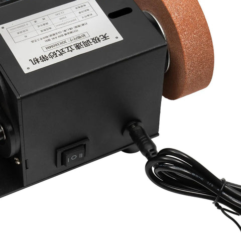 Close-up of Heavy Hitter Mini Belt Sander With 350W All Copper Motor, showing switch and power cord for workshop use.