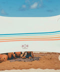 Lightweight 7x7 Foot Beach Tent Sun Shelter with sand anchors, easy setup, UPF 50+ shade canopy for family outings, rainbow color on beach