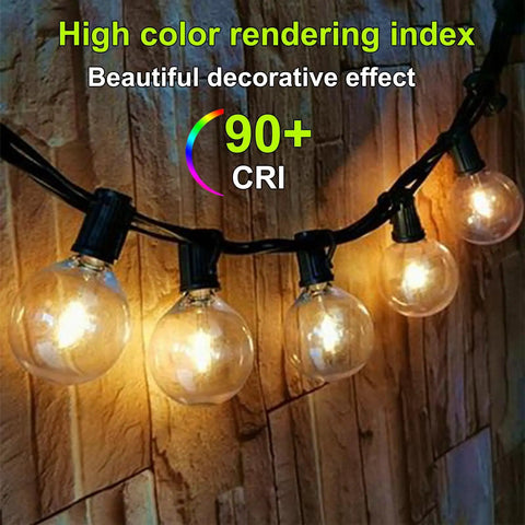 25 Watt Wax Warmer Bulbs 120V E12 Base G50 glowing string lights on brick wall, highlighting warm white light and decorative effect.
