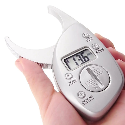 Portable Skinfold Caliper With LCD Screen For Easy Body Fat Measurement, Handheld Fitness Tool For Men And Women in hand