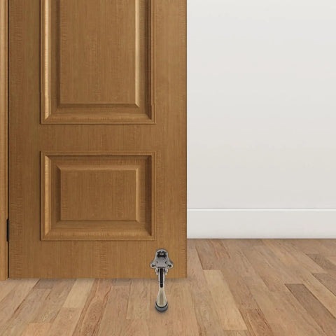 Kickdown Door Stopper For Commercial And Garage Doors Dope Heavy-Duty Zinc Alloy Build With Foot-Operated Design installed on wooden door