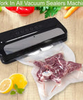 Six Pack Vacuum Sealer Bags Rolls In Two Sizes 8 By 20 Inches And 11 By 20 Inches BPA Free Puncture Resistant Universal Clamp Style Fit All Sealer Machines Great For Food Storage And Sous Vide Cooking in use with vacuum sealer on wooden surface