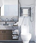 Towel Warmer Wall Mount Black 6 Bar Stainless Steel Heated Drying Rack for Bathroom next to modern sink and toilet.