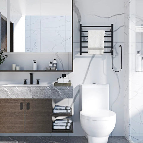 Towel Warmer Wall Mount Black 6 Bar Stainless Steel Heated Drying Rack for Bathroom next to modern sink and toilet.