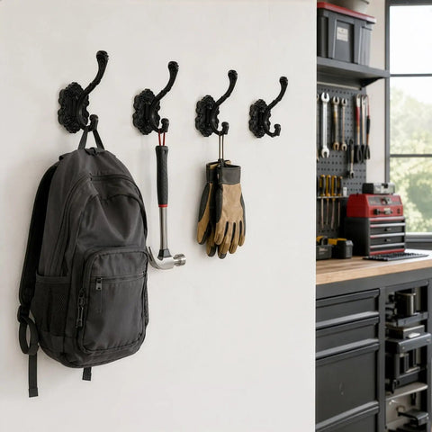 Solid Build Vintage Black Wall Hooks Heavy Duty Coat And Towel Rack Four Pack holding a backpack, hammer, and gloves on a wall.