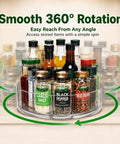 Four Pack 10.5 Inch Lazy Susan Organizers Smooth Operator Turntable Trays With Heavy Duty Non Slip Base, clear tray with spices in a pantry.