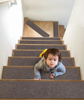 Non Slip Stair Treads 14 Pack For Indoor Wooden And Tile Steps, Easy Removal Safety Mats, Kid Friendly, Grey, child on stairs