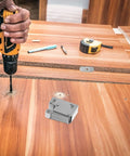 Stainless Steel Roller Catch For Wardrobe And Kitchen Cabinets, Press To Open Door Latch with drill on wooden surface