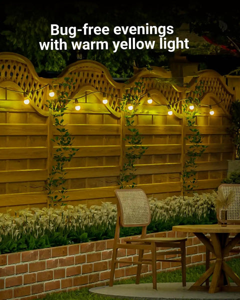 Yellow Outdoor A19 LED Bug Light Bulbs Dusk to Dawn Auto On Off Photocell Sensor 9W 480 Lumens 2000K Amber Glow lighting a backyard