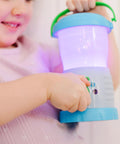 Child holding Durable Light And Sound Camping Lantern Toy with six color modes and sound effects.