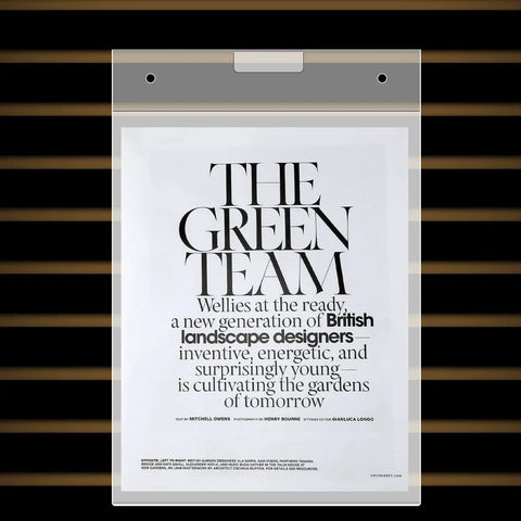 Front view of Three Pack 8.5x11 Clear Slat Wall Sign Holders For Menus And Flyers on slatwall with flyer inside
