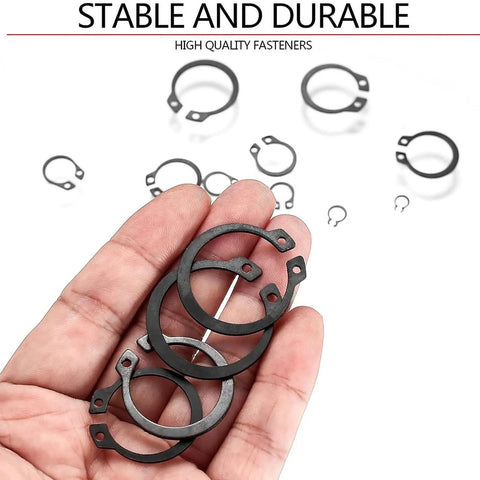 Heavy Duty Multiple Size Clip Set Ranging From 4mm To 28mm For Heavy Machinery And Car Repair Jobs That Won`t Rust Steel Rings held in hand.