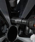 Impact Socket Set 3/8 Inch Drive, 90 PC Beefy CR-MO Steel Kit in use on car wheel lug nut with drill
