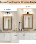 Dope Two Light Vanity Light Over Mirror 17 Inch Black And Gold Wall Sconce Lighting With White Glass Globe Shades showing lighting direction