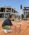 Heavy Duty Laser Level Tripod Stand With Five Eighths Inch Eleven Thread Mount Adjustable From Sixteen To Sixty Five Inches Aluminum Pro Grade Construction Retractable Legs Non Skid Feet Supports Up To Twelve Pounds on a jobsite