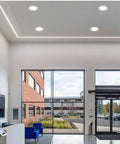 Slick 12W Recessed LED Downlight Boasting Deep Anti Glare Lens 75mm Cutout CRI85 3000K Warm White Ceiling Spotlight in modern office.