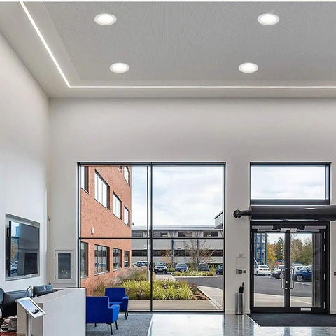 Slick 12W Recessed LED Downlight Boasting Deep Anti Glare Lens 75mm Cutout CRI85 3000K Warm White Ceiling Spotlight in modern office.