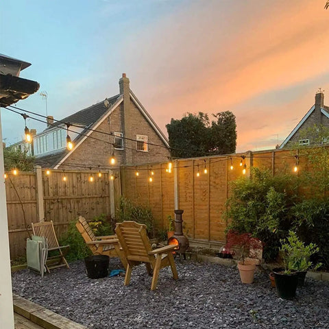 Outdoor patio with string lights featuring 25 Pack 2W S14 LED Bulbs Replacement for Outdoor String Lights, 2700K Soft Warm White.