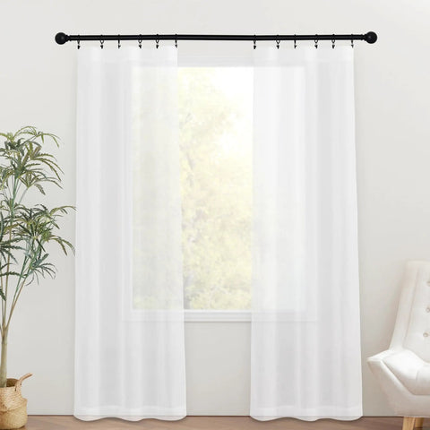 Two Panel Sheer Voile French Door Curtains with Light Filtering displayed on rod in rustic room