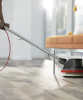 Person using Multi Purpose Commercial Orbital Floor Cleaner For Hard Floors And Carpets, Random Orbital Drive.